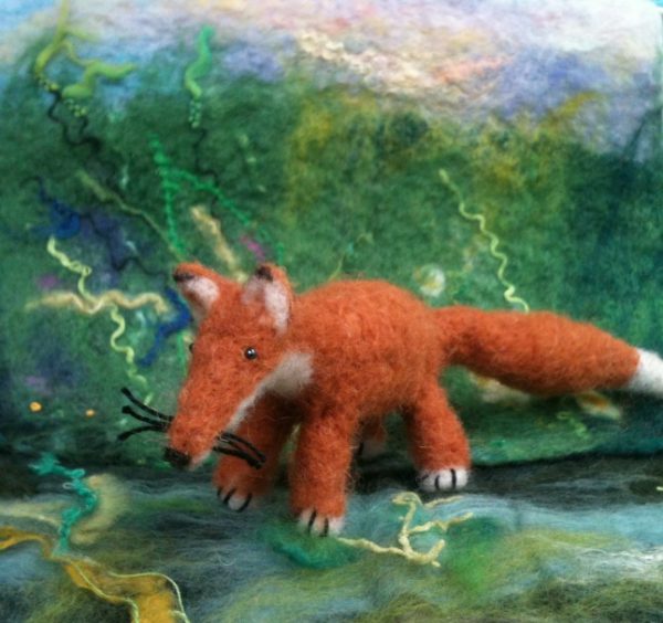 Needle felted fox in woodland scene