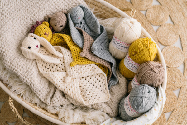 all cute comforters from the Cute Comforter Crochet Kit in a basket
